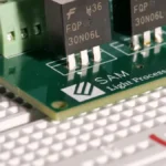 What is the primary control difference between BJTs and MOSFETs?